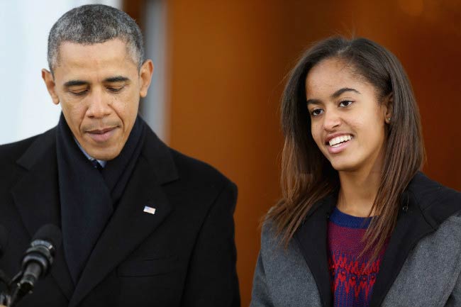 Malia Obama with father Barack Obama at the White House conference in November 2013