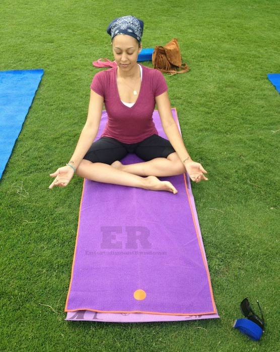 Tia Mowry doing Yoga for her new DVD