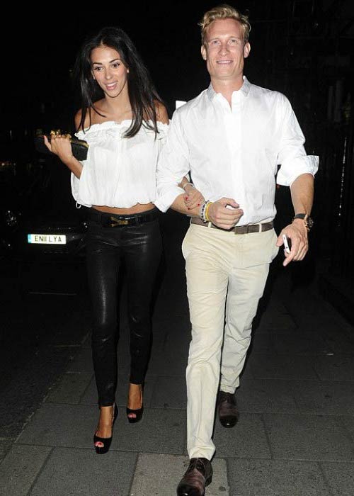 Georgia Salpa and Joe Penna leaving restaurant in Marbella in August 2012 