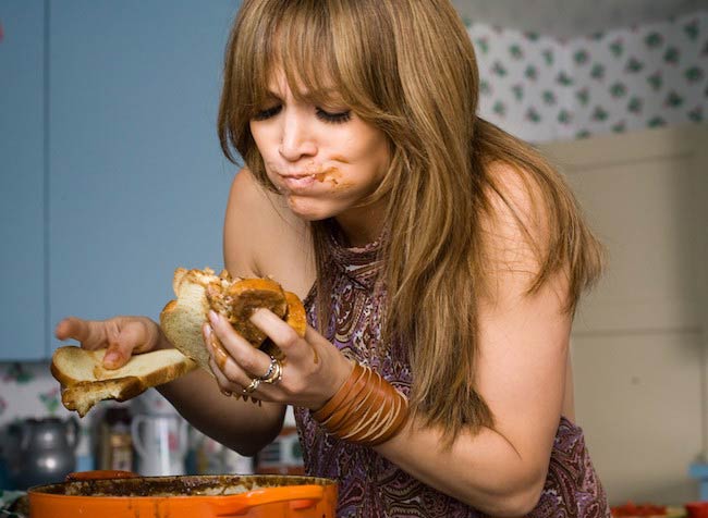 Jennifer Lopez eating a bread sandwich