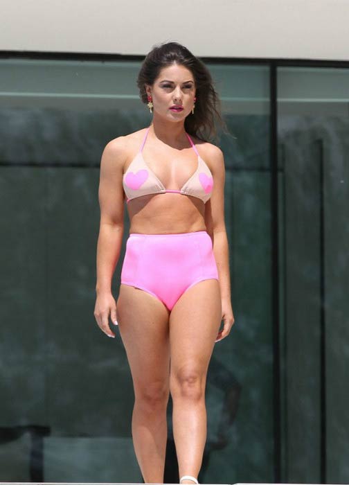 Louise Thompson poses for a calendar bikini shoot in September 2014