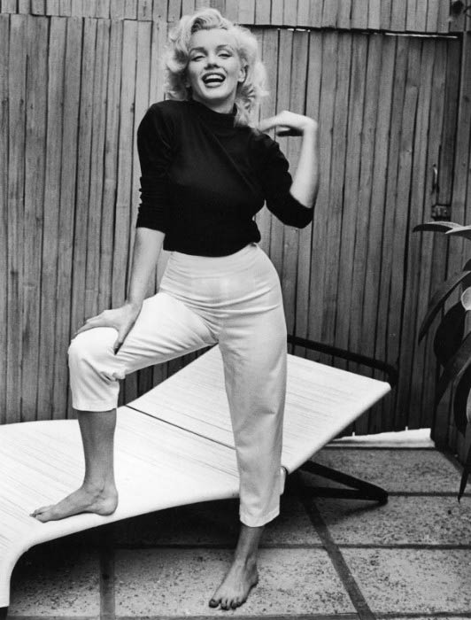 Marilyn Monroe poses for a modeling photoshoot