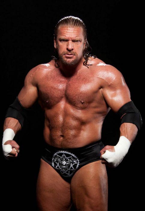 Triple H shirtless in a file picture for the WWE website