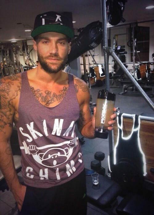 Calum Best holding a protein shake