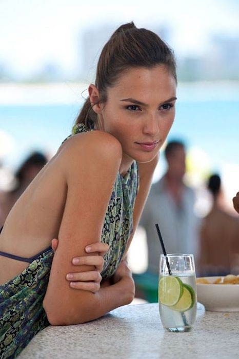 Gal Gadot with a lemon drink