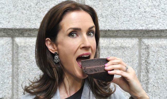 Maia Dunphy having a piece of chocolate cake