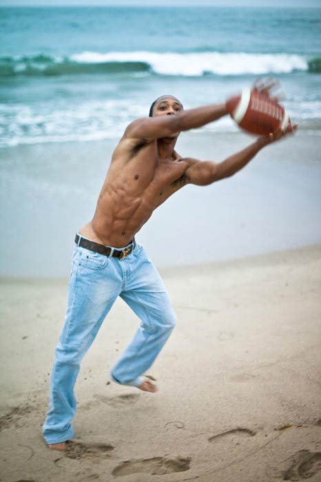 Romeo Miller shirtless in a beach photoshoot done in 2015