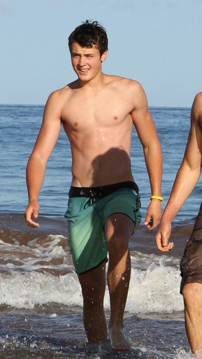 Dylan Efron shirtless at the beach in Maui in December 2016