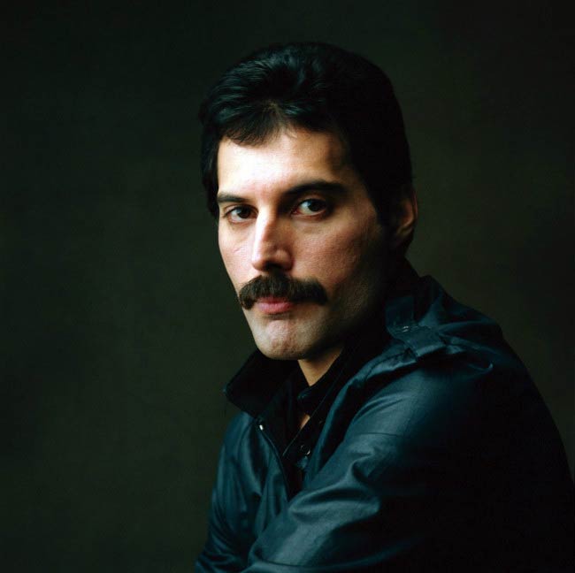 Freddie Mercury poses for a modeling photoshoot