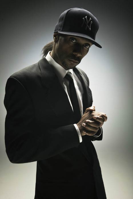 Krayzie Bone poses for a modeling photoshoot