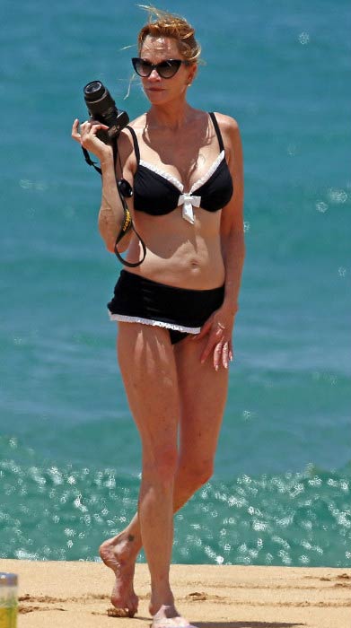 Melanie Griffith at the beach in Cannes in July 2012