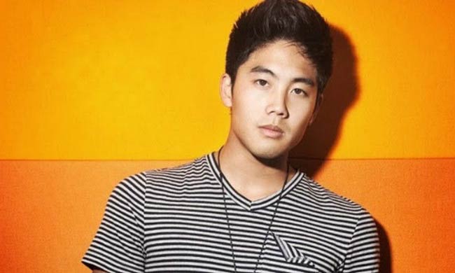 Ryan Higa poses for a modeling photoshoot done in 2014