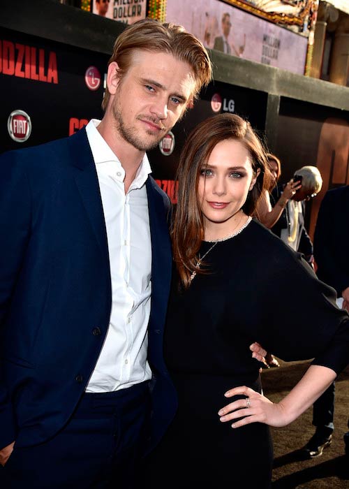 Boyd Holbrook with former girlfriend Elizabeth Olsen during the Godzilla Premiere in Hollywood, California on May 8, 2014