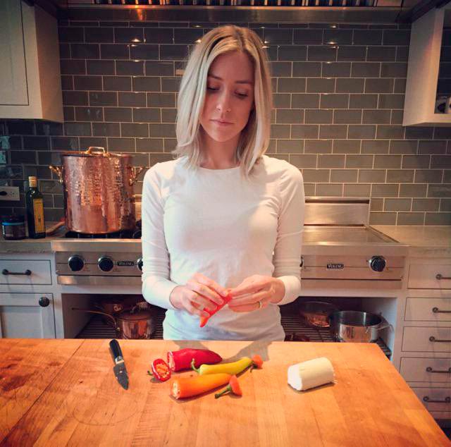 Kristin Cavallari peeling and chopping vegetables