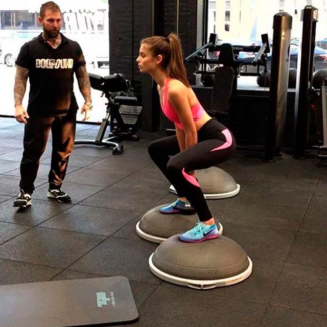 Taylor Hill doing squats