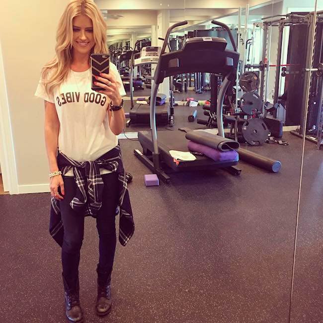 Christina El Moussa wearing her favorite outfit - denim, tee and boots