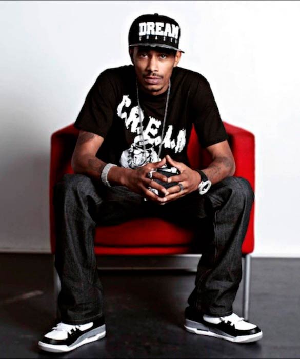 Layzie Bone poses for a modeling photoshoot