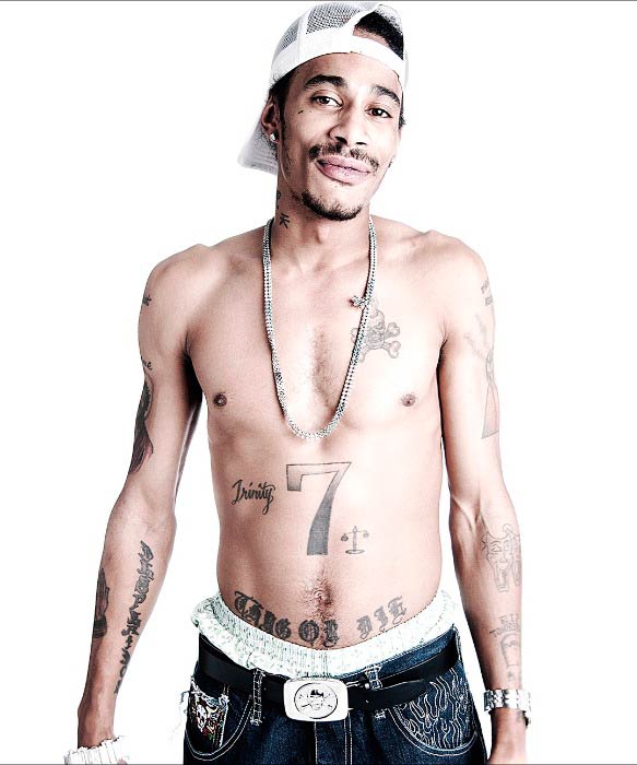 Layzie Bone shirtless strikes a poses for a photoshoot