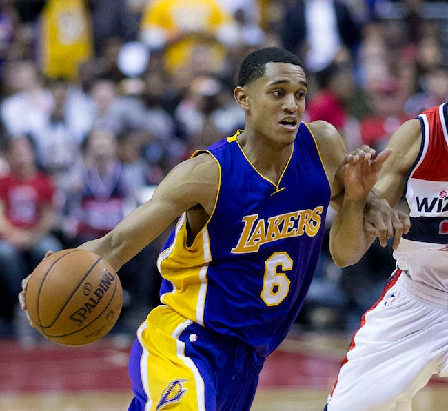 Jordan Clarkson dribbles against Otto Porter of Washington Wizards in a December 2015 match