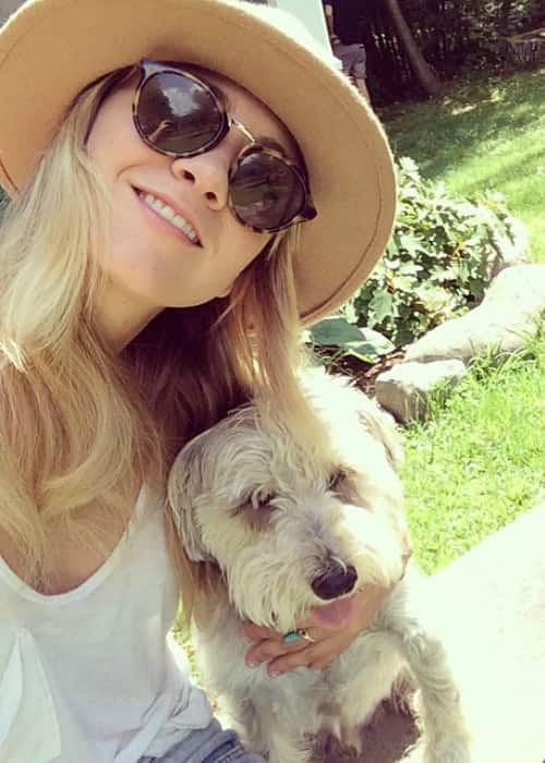 Meredith Hagner in a selfie with her dog in August 2014