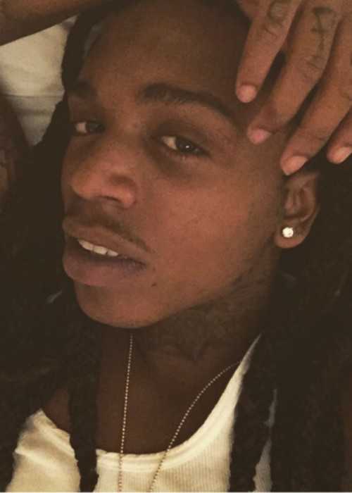 Rapper Jacquees in a Bedroom Selfie