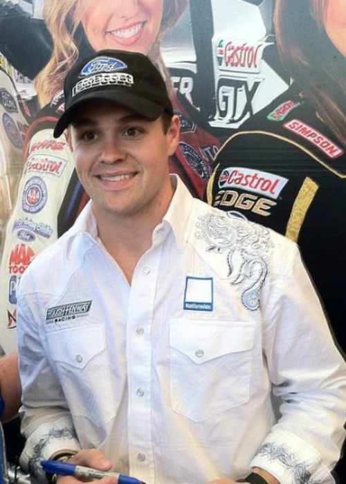 Ricky Stenhouse Jr. signing autographs in August 2013