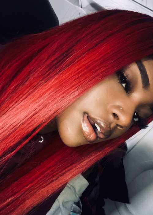 Summerella showing her red hair in an Instagram selfie in December 2017