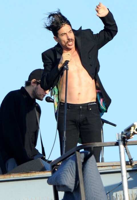 Anthony Kiedis and Josh Klinghoffer (background) during a Red Hot Chili Peppers Concert in July 2011