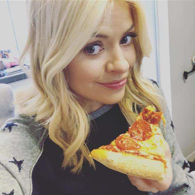 Holly Willoughby having pizza in the breakfast in January 2018