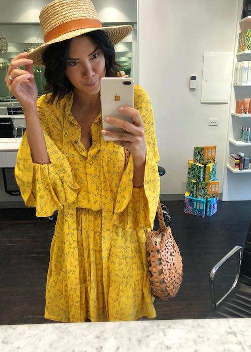 Julie Stevanja in a January 2018 selfie wearing bright yellow color