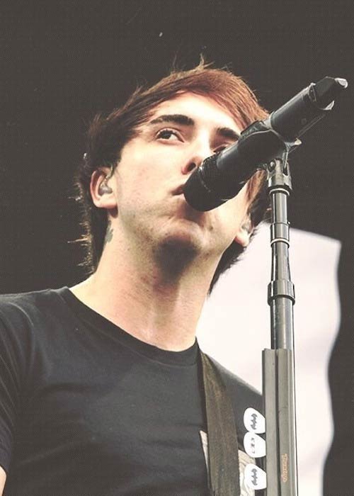 Alex Gaskarth while giving a performance in 2013