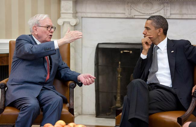 Barack Obama in a meeting with Warren Buffett in the Oval Office in July 2011