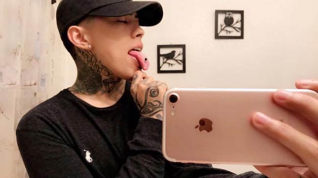 Frimzy showing his tongue piercing in May 2017 selfie