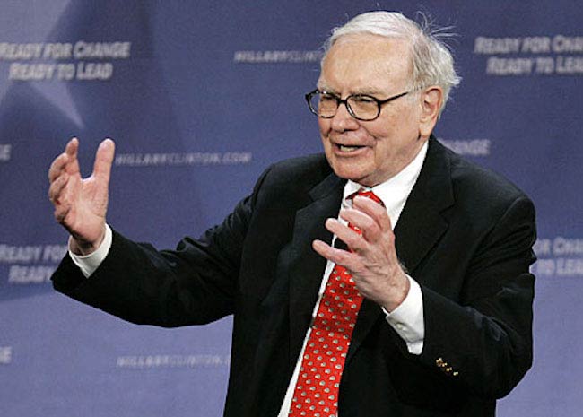 Warren Buffett while addressing people in an old picture