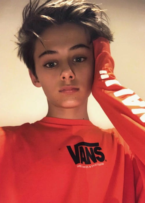 William-Franklyn Miller Promotings Vans in a selfie in November 2017