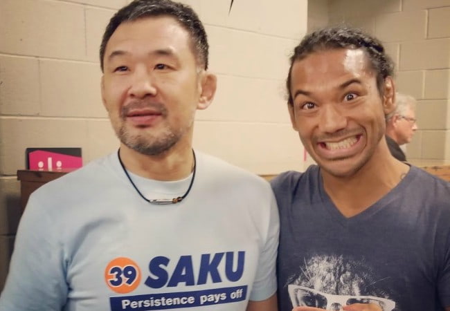 Benson Henderson (Right) and Kazushi Sakuraba as seen in July 2017