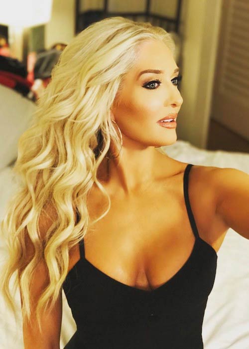 Erika Jayne looking amazing with hair done and black top as seen in April 2017