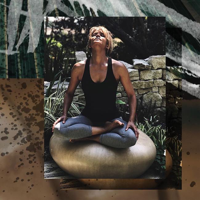 Halle Berry meditating in her home garden in 2018