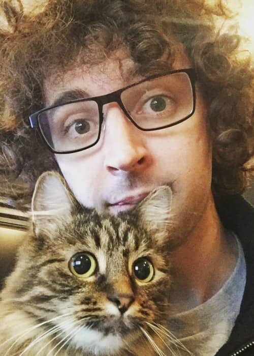 Joseph Garrett in a selfie with his cat in October 2016