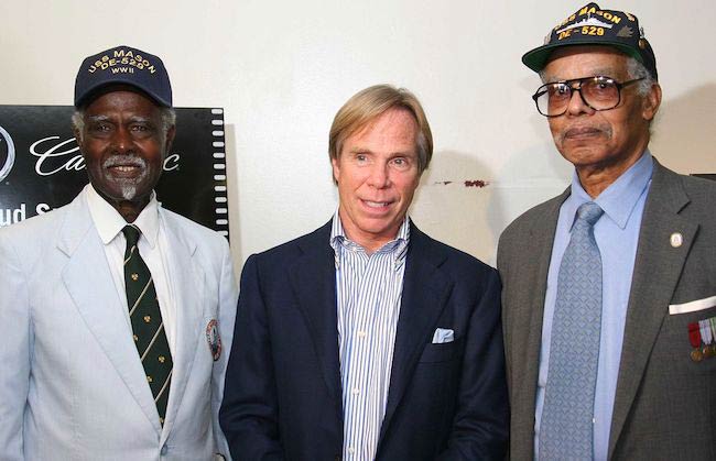 Tommy Hilfiger (Center) with World War II veterans during the screening of play Proud in 2005