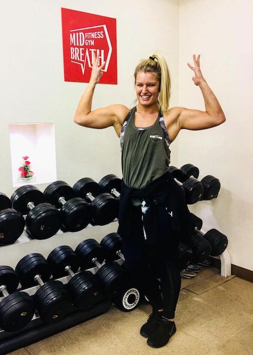 Toni Storm showing her biceps in the gym in March 2018