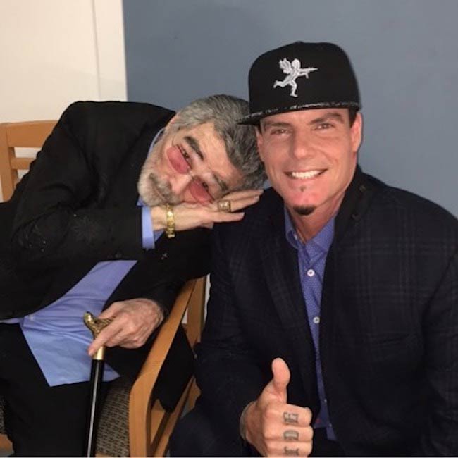 Vanilla Ice and Burt Reynolds posing in April 2018