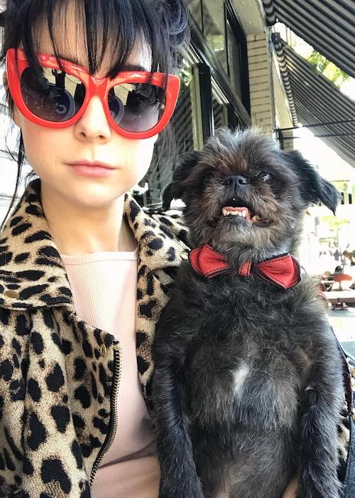 Alessandra Torresani with her dog Pee Wee Herman at Little Dom's in 2018