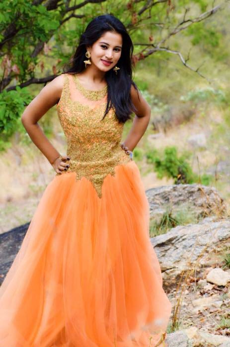 Anusha Rai in orange in a 2017 photoshoot