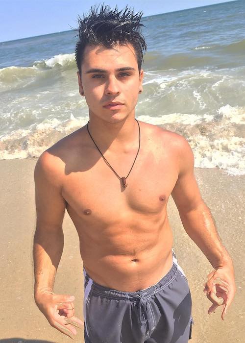 Cyrus Dobre shirtless body on the Fire Island in New York in July 2017