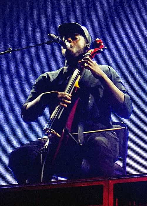 Kevin Olusola performing with Pentatonix in April 2015