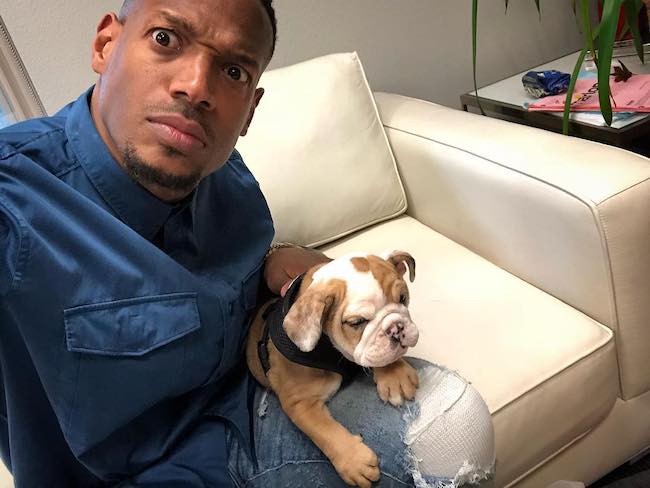 Marlon Wayans with his brother Mike Wayans' puppy in April 2018