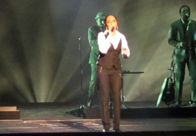 Sade performing with her band at SAP-Arena in November 2011