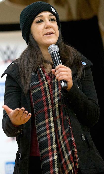 Bayley giving speech during a B.A. Star event in December 2016
