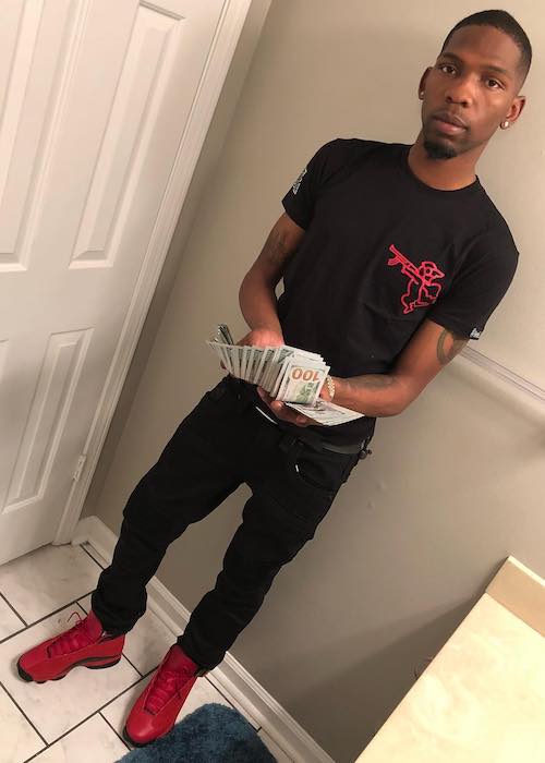 BlocBoy JB with a pile of cash in 2018